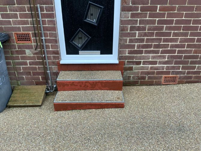 Before image of customers driveway that needed a new apperance